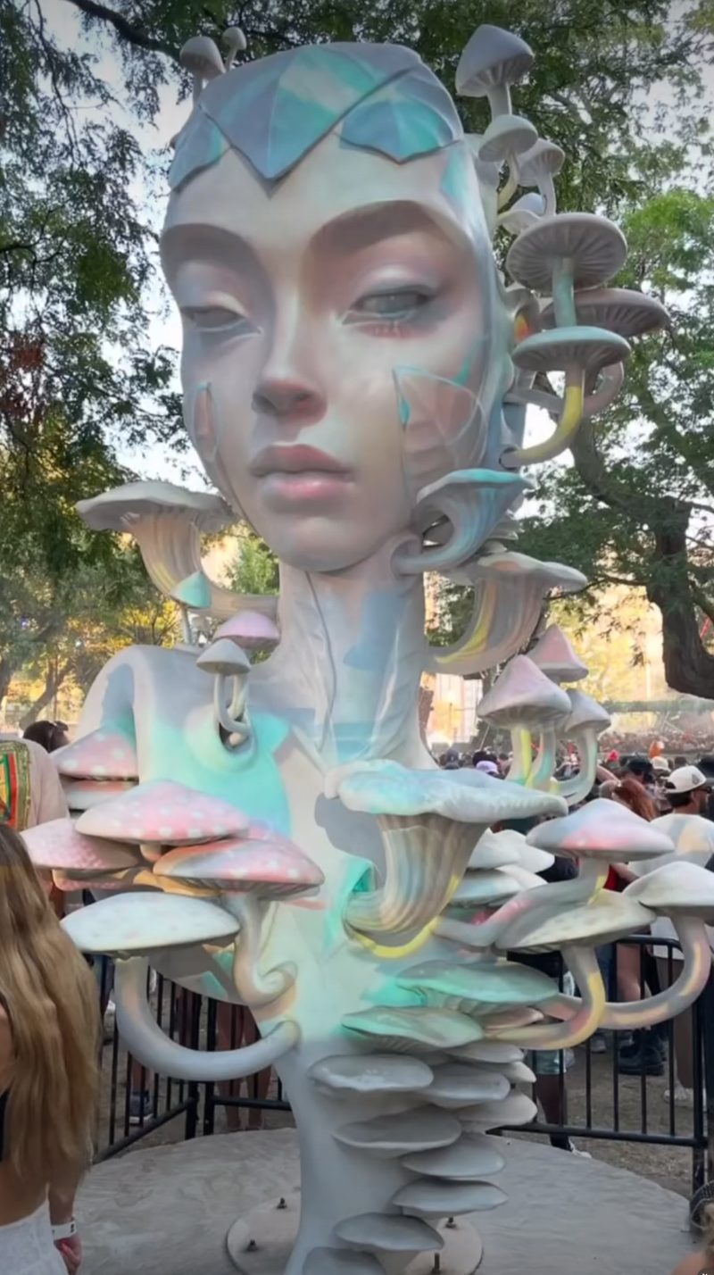 Mycelia, a sculpted face with pastel mushrooms by Daniel Popper, at ARC Music Festival