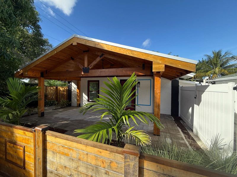 Timber-framed gable entrance porch in Fort Lauderdale, Florida