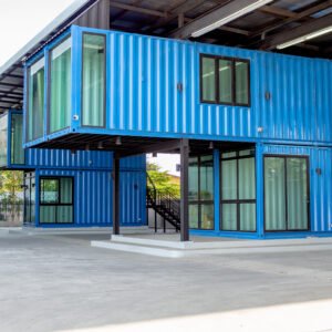 Modern blue cutting-edge shipping container construction office building.